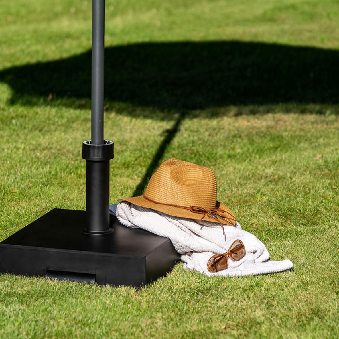 Black parasol base with shadow